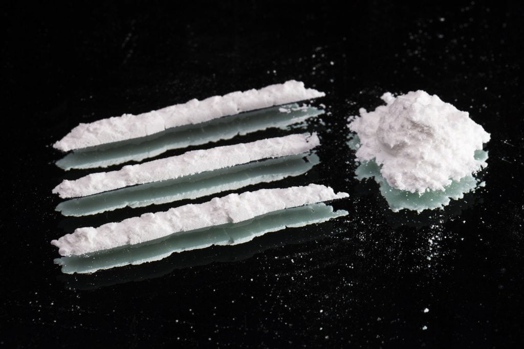 cocaine spread on a flat surface