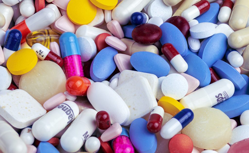 A bunch of colorful pills.